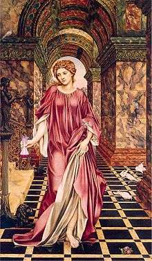 Young woman in  a flowing gown walks barefoot on a tiled floor upon which are a few doves. Marble walls and  arched halls are behind her.