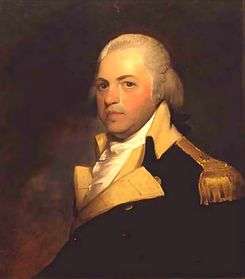 Portrait shows a white-haired man in a dark blue military uniform with buff lapels and gold epaulettes.